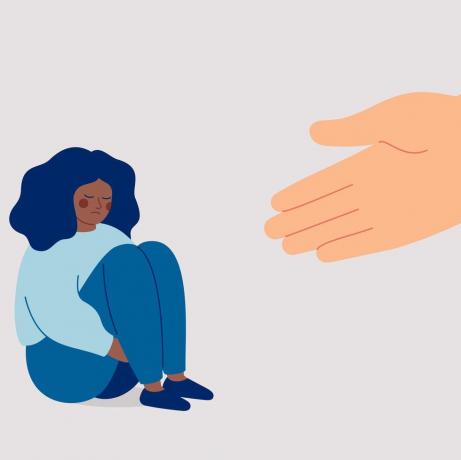 insan eli üzgün siyah bir kadının kaygıdan kurtulmasına yardım ediyor danışman psikolojik sorunları olan Afrikalı Amerikalı kıza destek oluyor